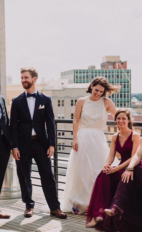 bridal party on a rooftop